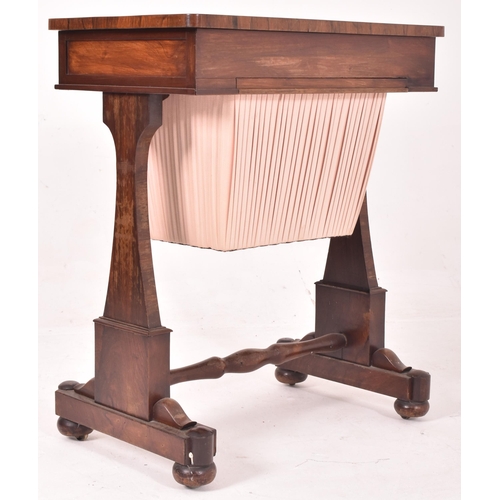 626 - An early 19th century flame mahogany rectangular sewing table. The table having a curved edge rectan... 