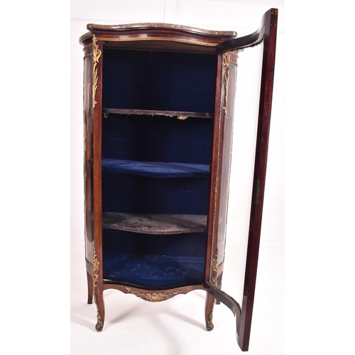 630 - A French Empire early 20th century serpentine fronted mahogany cabinet in the manner of Vernis Marti... 