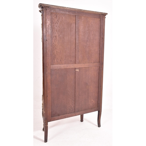 630 - A French Empire early 20th century serpentine fronted mahogany cabinet in the manner of Vernis Marti... 