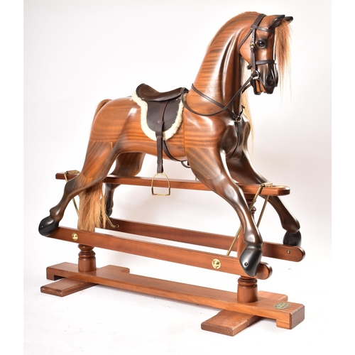 634 - Geoff Martin - Handcrafted rocking horse - A 20th century carved chestnut rocking horse. The horse h... 