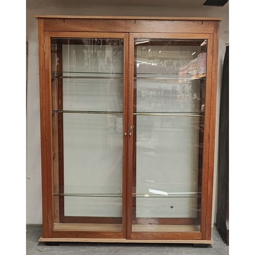 398 - A large 20th century pine wood & mahogany haberdashery shop display cabinet. The cabinet having a pe... 