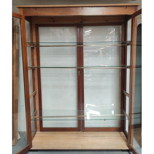 398 - A large 20th century pine wood & mahogany haberdashery shop display cabinet. The cabinet having a pe... 