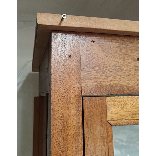 398 - A large 20th century pine wood & mahogany haberdashery shop display cabinet. The cabinet having a pe... 