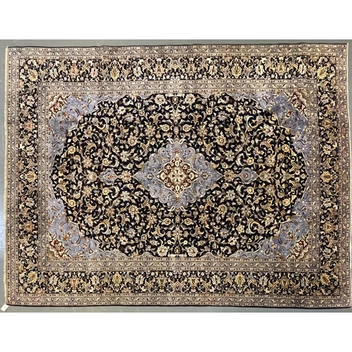 543 - A large early 20th century Central Persian Islamic Kashan floor carpet rug. The rug having a central... 