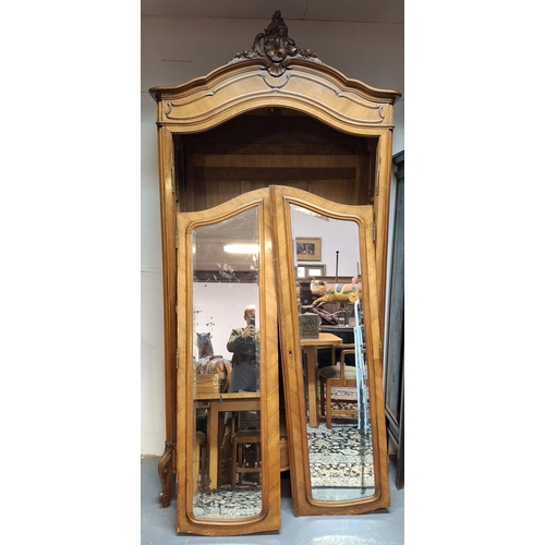 623 - A French 19th century Louis XV style kingwood mirror front armoire wardrobe. The wardrobe having a  ... 