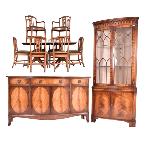 265 - Banks of Bristol - A George III Revival flame mahogany veneered dining room suite comprising extendi... 