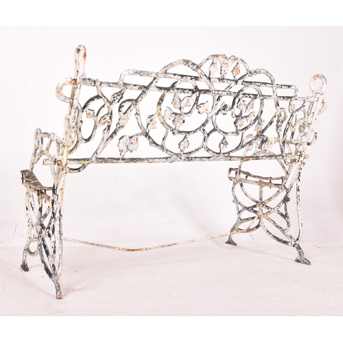 262 - A Victorian 19th century Coalbrookedale manner white painted reclaimed cast iron garden bench. The b... 