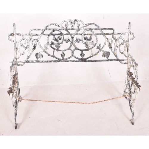 262 - A Victorian 19th century Coalbrookedale manner white painted reclaimed cast iron garden bench. The b... 