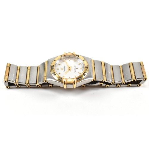 25 - An Omega Constellation ladies wristwatch boxed. The Omega wristwatch having a white mother of pearl ... 