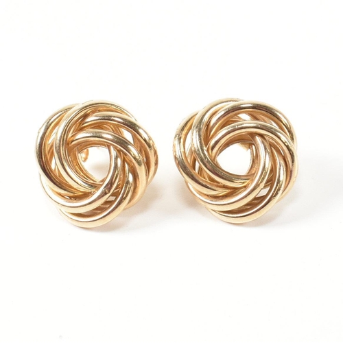 52 - A pair of hallmarked 9ct gold knot stud earrings. The stud earrings having a multi strand knot desig... 