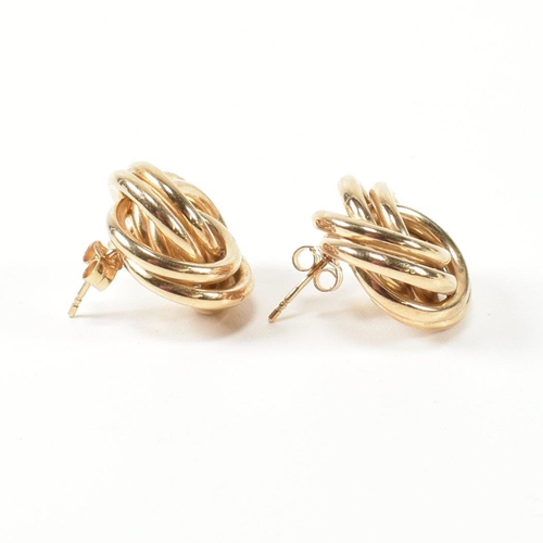 52 - A pair of hallmarked 9ct gold knot stud earrings. The stud earrings having a multi strand knot desig... 