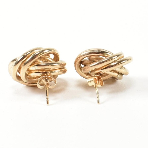 52 - A pair of hallmarked 9ct gold knot stud earrings. The stud earrings having a multi strand knot desig... 