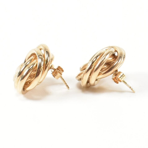 52 - A pair of hallmarked 9ct gold knot stud earrings. The stud earrings having a multi strand knot desig... 