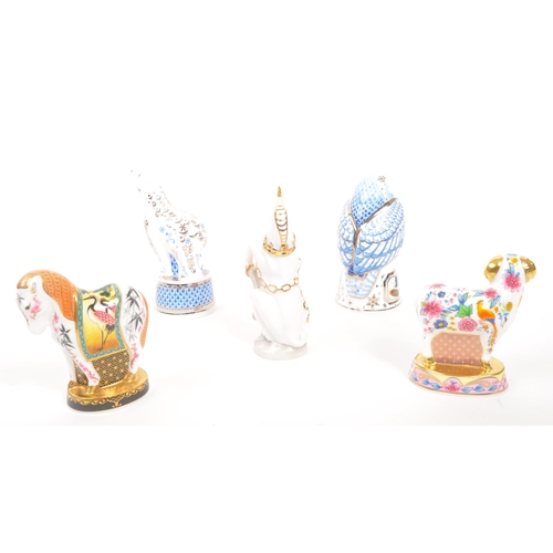 108 - Royal Worcester - A collection of five porcelain china Royal Worcester candle snuffers. Comprising o... 