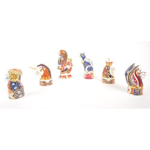 109 - Royal Worcester - A collection of six porcelain china Royal Worcester candle snuffers figures. Compr... 