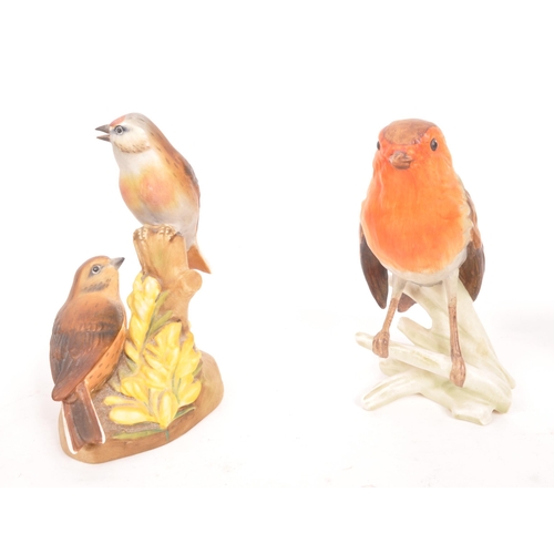 119 - Beswick / Goebel / Royal Worcester - A collection of ten porcelain china figures in the form of bird... 