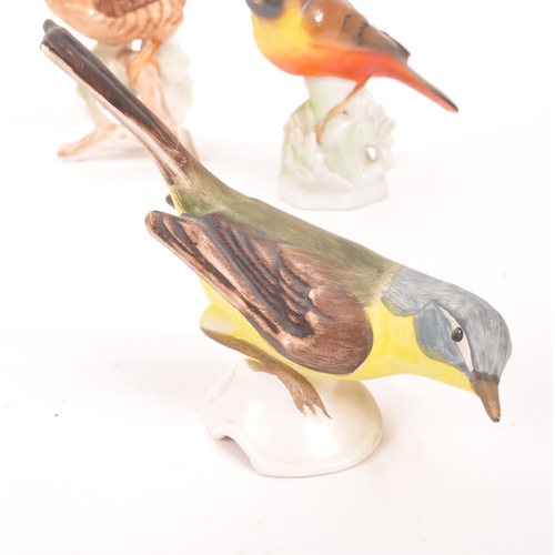 119 - Beswick / Goebel / Royal Worcester - A collection of ten porcelain china figures in the form of bird... 