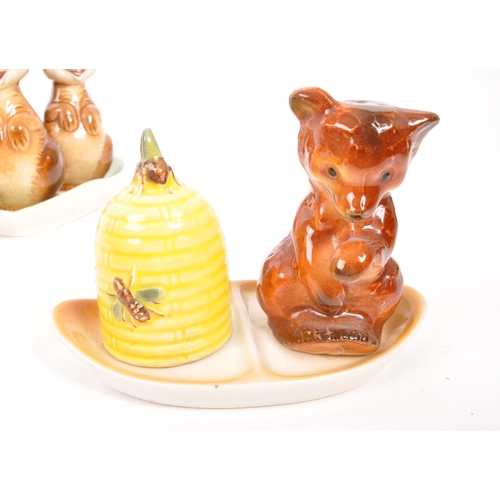 121 - Goebel - A collection of porcelain china Goebel condiment containers to include bunny cruet set and ... 