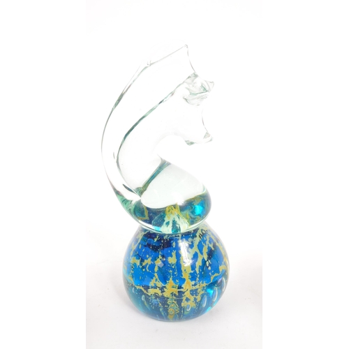 135 - Mdina / Selkirk - A collection of four mid 20th century studio art glass paperweights. The collectio... 