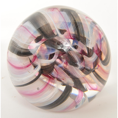 147 - Caithness - A 20th Century vintage Caithness glass paperweight ' Ribbons ' having white, black and p... 