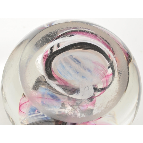 147 - Caithness - A 20th Century vintage Caithness glass paperweight ' Ribbons ' having white, black and p... 