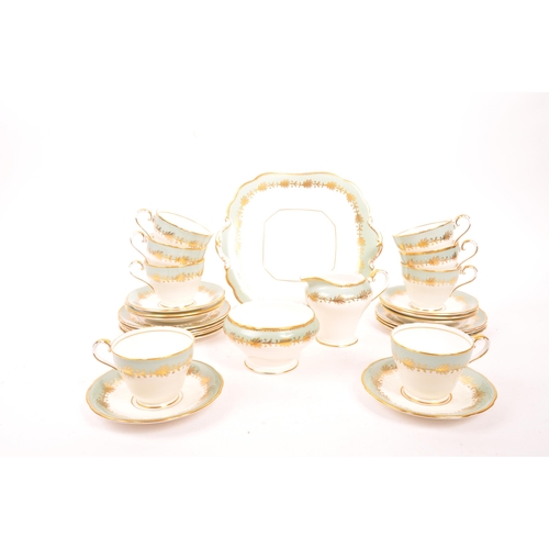 153 - Aynsley - A 20th century porcelain china tea service / set. Comprising of tea cups, saucers, side pl... 