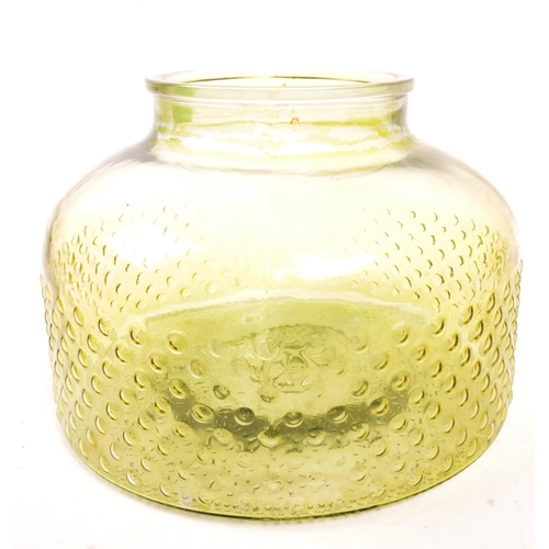 155 - A large 20th Century retro round squat green glass vase / carboy with textured circular design to bo... 