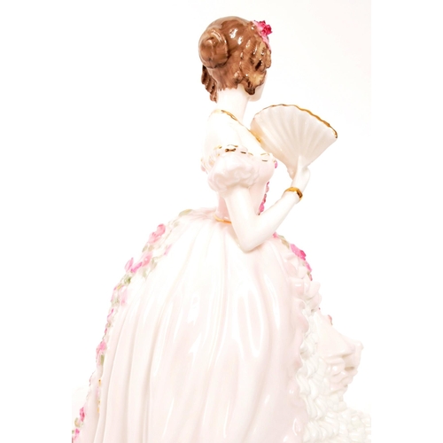 156 - Coalport - Champagne Waltz - A limited edition porcelain Coalport figurine entitled Champagne Waltz ... 