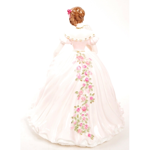 156 - Coalport - Champagne Waltz - A limited edition porcelain Coalport figurine entitled Champagne Waltz ... 