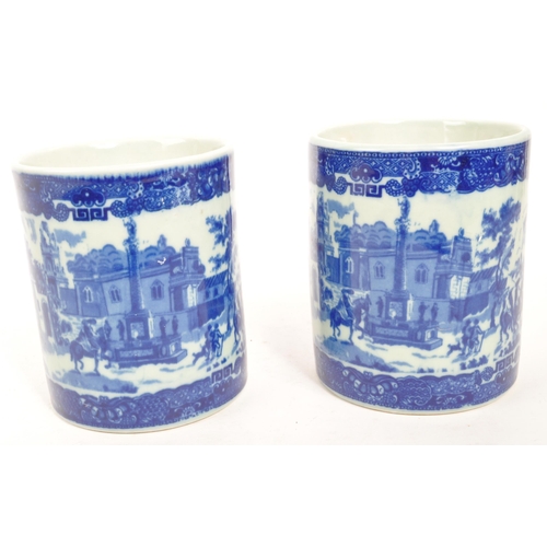 160 - A pair of large Victorian style Ironstone braided handle ceramic china mugs. Each mug featuring a br... 