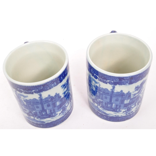 160 - A pair of large Victorian style Ironstone braided handle ceramic china mugs. Each mug featuring a br... 