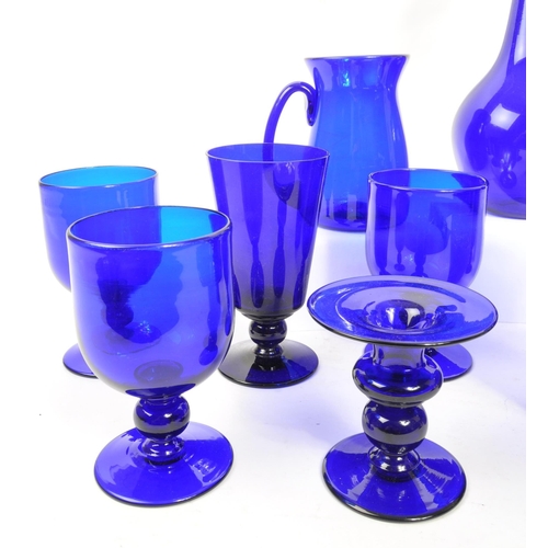 162 - Bristol Blue Glass - A collection of Bristol Blue Glass comprising of a decanter, six wine / stem gl... 