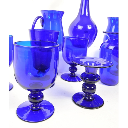 162 - Bristol Blue Glass - A collection of Bristol Blue Glass comprising of a decanter, six wine / stem gl... 