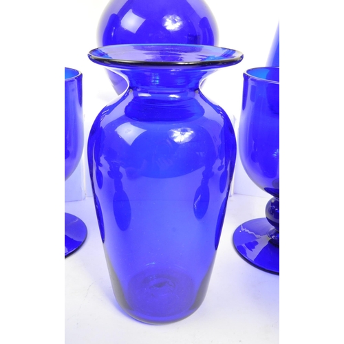 162 - Bristol Blue Glass - A collection of Bristol Blue Glass comprising of a decanter, six wine / stem gl... 