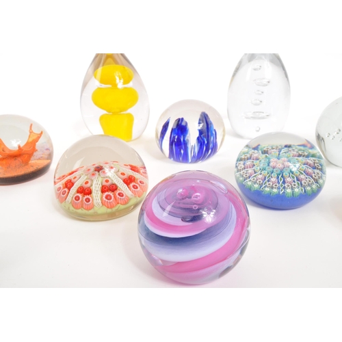 168 - Caithness / Strathearn - A collection of ten glass paperweights comprising of Caithness ' Dizzy ', a... 