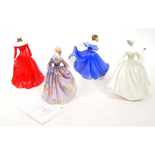 169 - Royal Doulton - A collection of four porcelain Royal Doulton figurines. Comprising of Winters Walk H... 