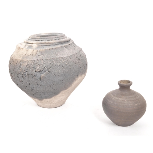 171 - Two ceramic Cornish artisan stoneware studio pottery vases one of spherical form with mottled textur... 