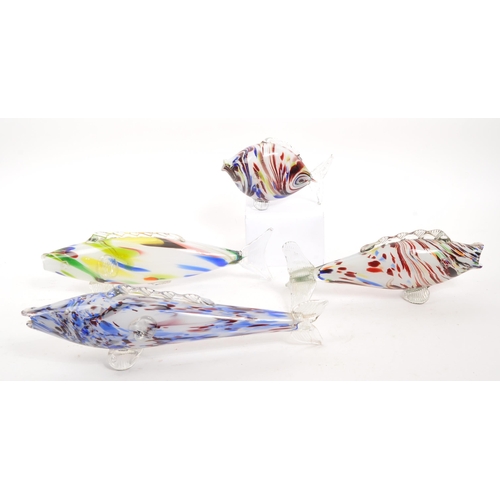 172 - Murano - A collection of four Italian studio art glass fish ornaments. Graduating sizes, with millef... 