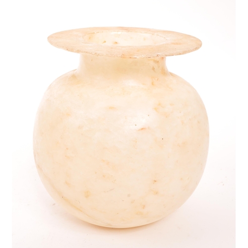 175 - A late 19th Century Egyptian handmade alabaster vase. The vase of rounded form with flat mouth rim. ... 