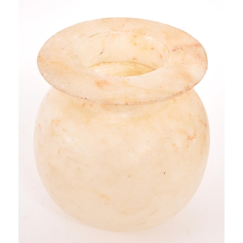 175 - A late 19th Century Egyptian handmade alabaster vase. The vase of rounded form with flat mouth rim. ... 