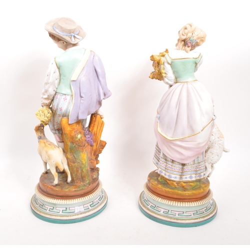 180 - A pair of 19th century Italian porcelain figures. The figures each raised on round pedestal bases, w... 