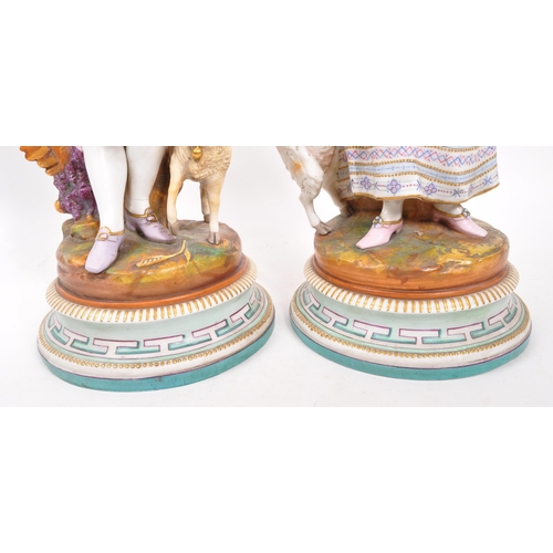 180 - A pair of 19th century Italian porcelain figures. The figures each raised on round pedestal bases, w... 