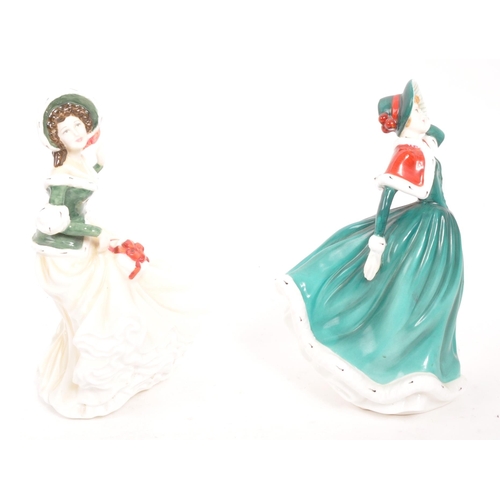 183 - Royal Doulton - Two contemporary porcelain china Christmas Day lady figurines. Christmas Day 2001 an... 