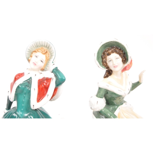 183 - Royal Doulton - Two contemporary porcelain china Christmas Day lady figurines. Christmas Day 2001 an... 