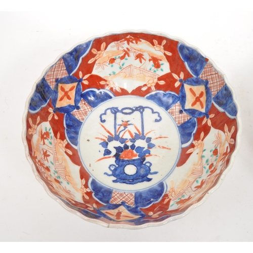 194 - A vintage 20th century Japanese / Chinese porcelain centrepiece bowls. One Japanese Imari example (A... 