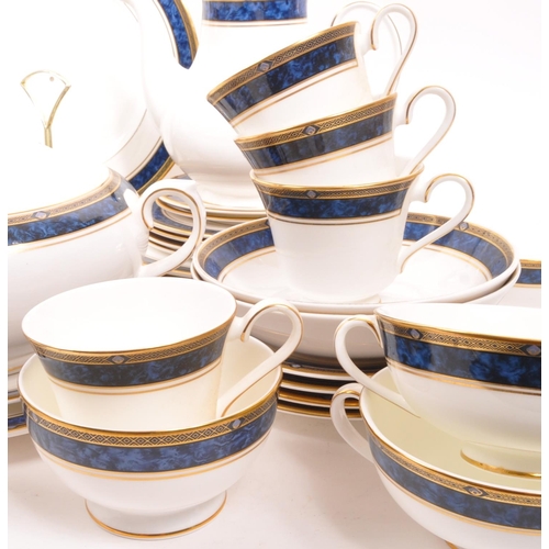 195 - Royal Doulton - A large porcelain china Royal Doulton dinner and tea service in the Stanwyck pattern... 