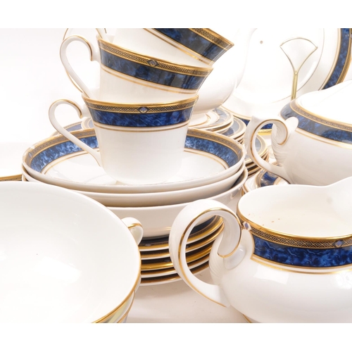 195 - Royal Doulton - A large porcelain china Royal Doulton dinner and tea service in the Stanwyck pattern... 