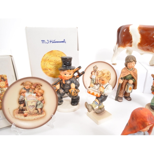 210 - W. Goebel - A collection of mid Century German W. Goebel for Hummel porcelain china figurines compri... 