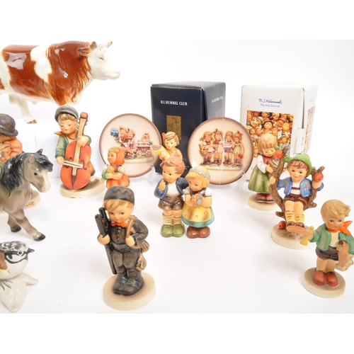 210 - W. Goebel - A collection of mid Century German W. Goebel for Hummel porcelain china figurines compri... 