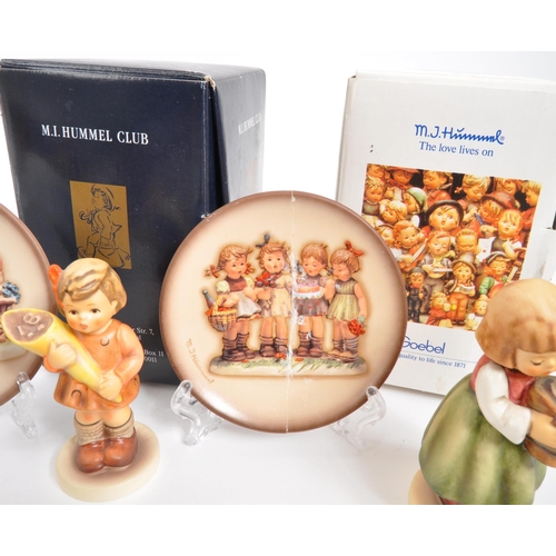 210 - W. Goebel - A collection of mid Century German W. Goebel for Hummel porcelain china figurines compri... 